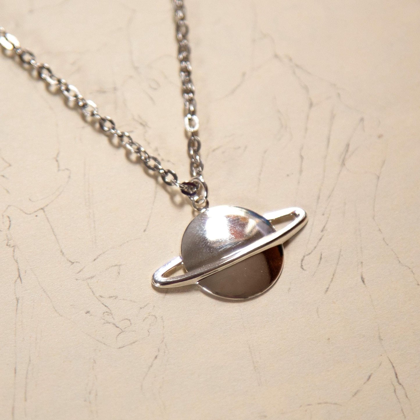 Silver Saturn Necklace