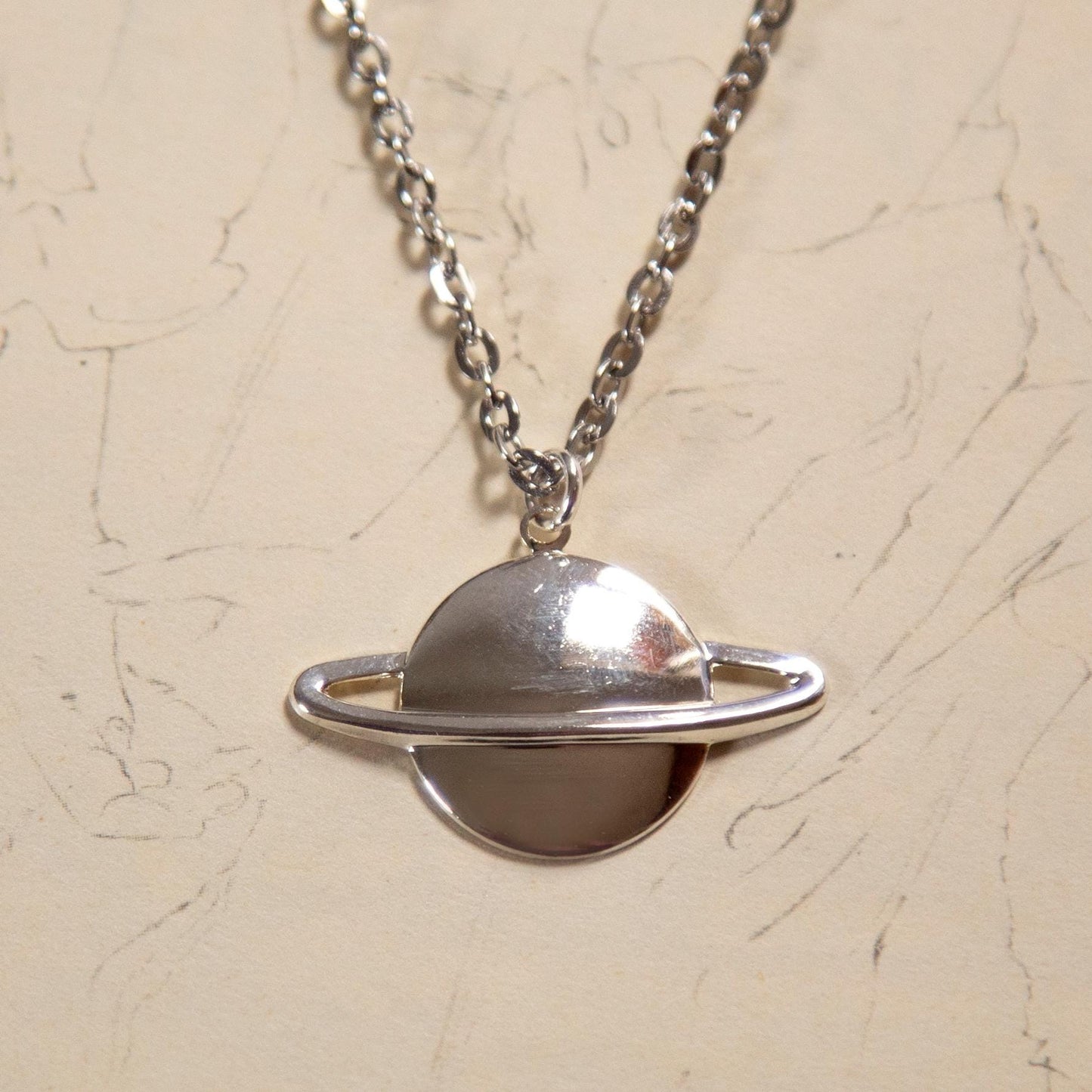 Silver Saturn Necklace